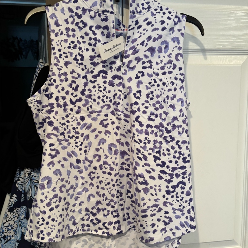 2 piecesTommy Bahama new with tags. Sleeveless printed top and matching skort